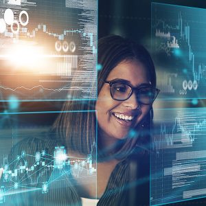 A smiling woman with glasses is superimposed over a backdrop featuring digital graphs and interface elements, suggesting a concept related to data analytics or technology.