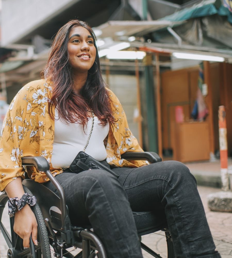 Young woman of color in wheelchair