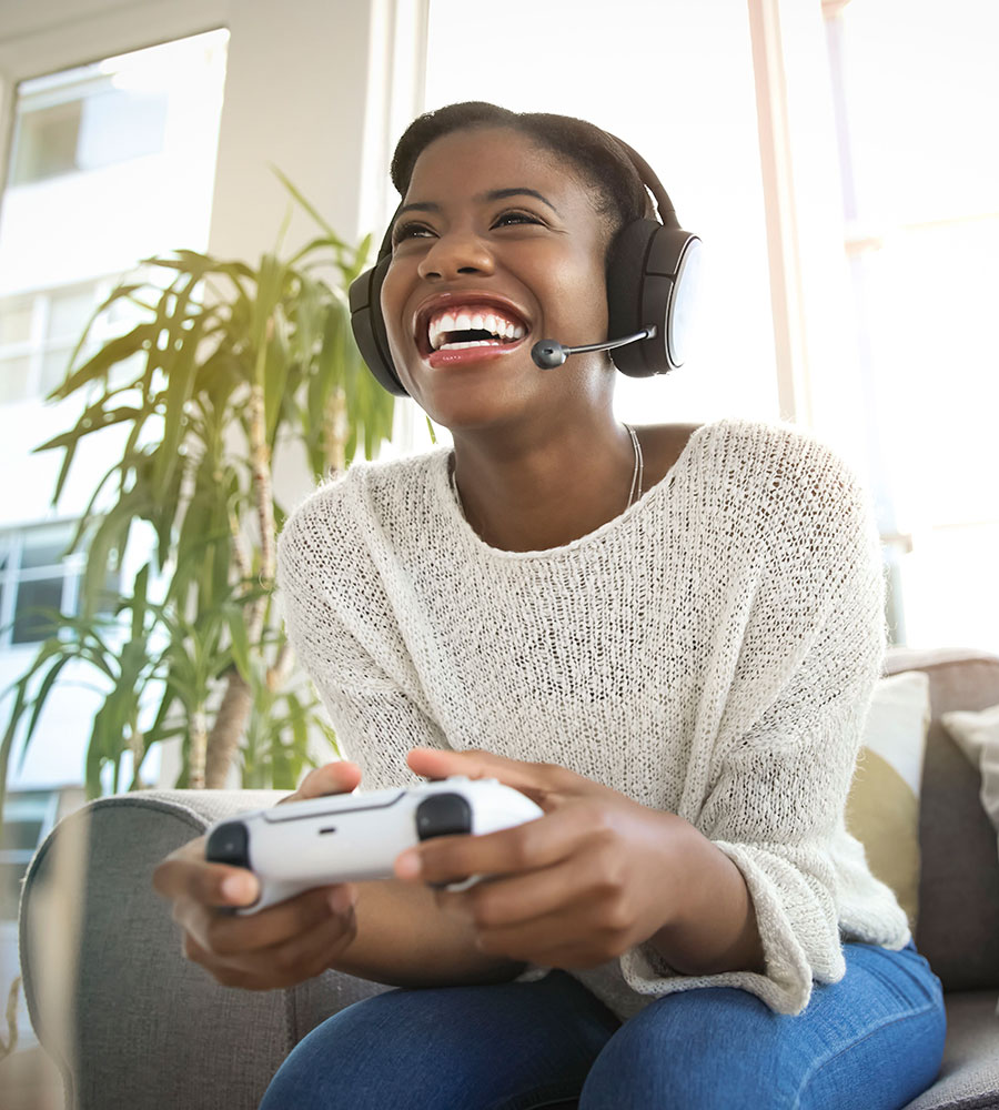 Teen girl playing video games