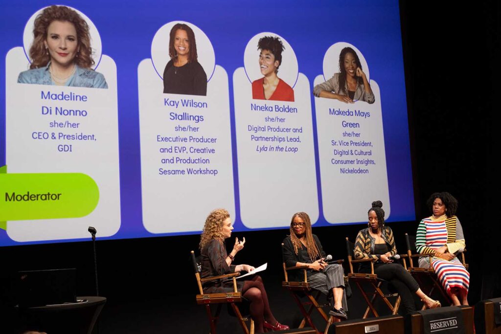 A panel discussion at the Geena Davis Institute’s "See Jane TV Report" event featuring moderator Madeline Di Nonno and panelists Kay Wilson Stallings, Nneka Bolden, Makeda Mays Green, and Ineka Bolden, with their titles displayed on the screen behind them.