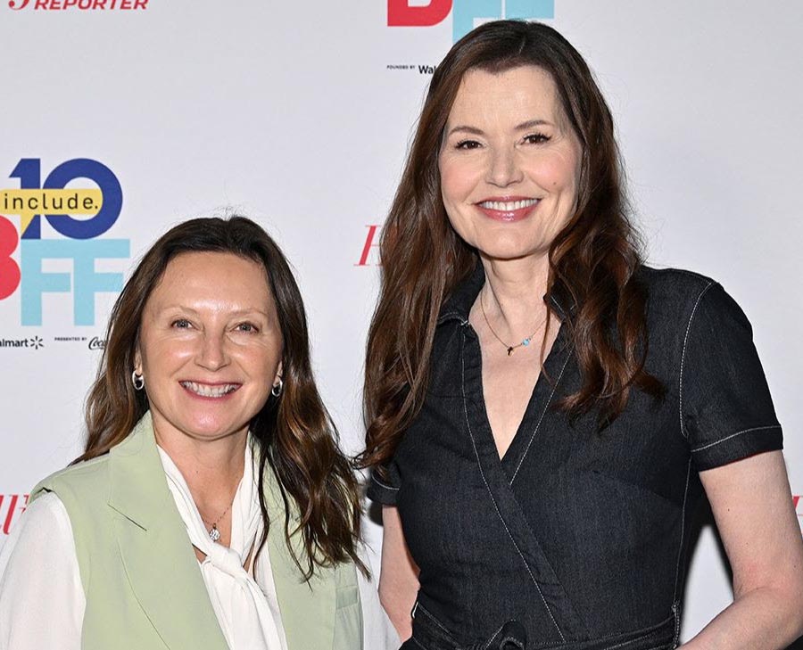 n the image, Wendy Guerrero (left) and Geena Davis (right) are posing at the Bentonville Film Festival event. Wendy is wearing a light green vest over a white blouse, and Geena is dressed in a black denim dress. Both are smiling in front of a backdrop featuring the Bentonville Film Festival logo and sponsor branding.